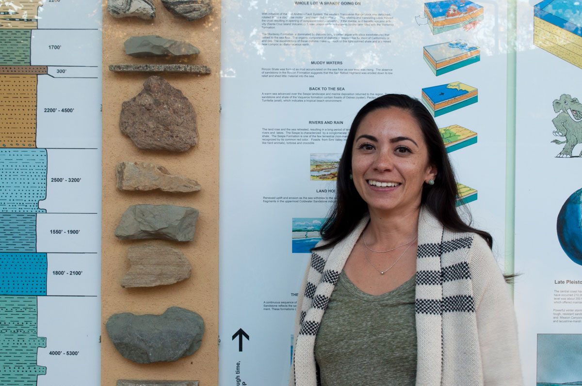 Stephanie Mendes, new full-time earth and planetary sciences instructor, stands next to rock samples Tuesday, Sept. 19 at the Earth and Biological Sciences Building in City College. Mendes received her doctorate in Marine Biology and Geochemistry at UCSB in 2014 and now teaches oceanography and historical geology.