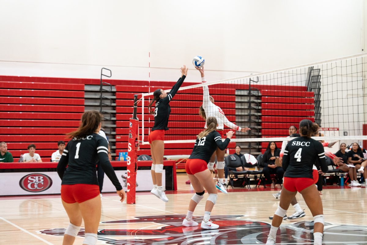 Kaylin Cooney blocks a ball during the game against Long Beach at the Sports Pavilion on Sept. 11 at City College in Santa Barbara, Calif. Apart from blocking many balls, she was also responsible for 16 points, which is more than any other player in the team.