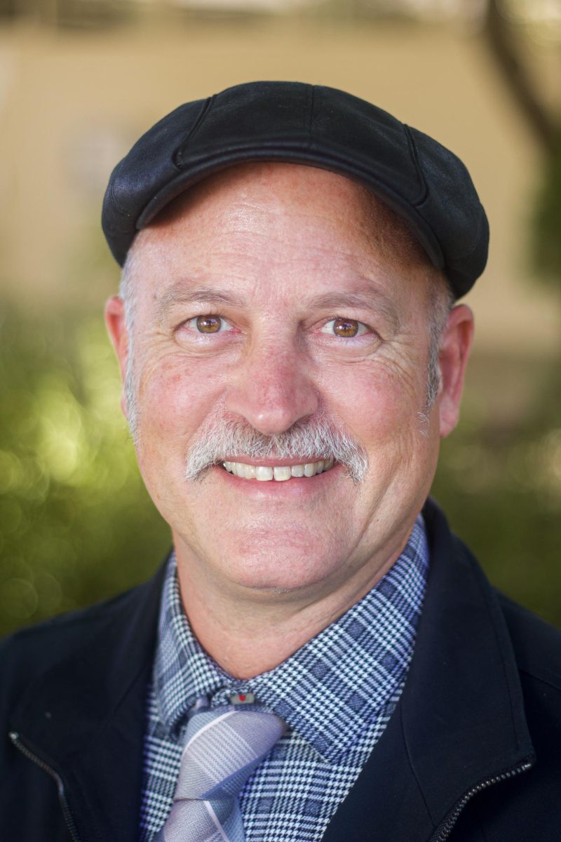 Kyle Richards, Board of Trustees District 2 Goleta candidate, grins on Sept. 26 at Wake Campus in Santa Barbara, Calif. "I've endorsed it...the facilities on campus could use some support," Richards said.