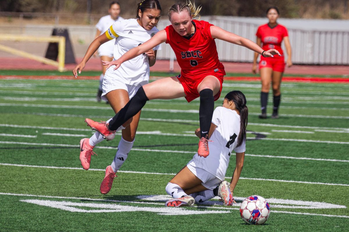 Julia Ryan leaps over the Rio Hondo defender on Sept. 27 at La Playa Stadium at city College in Santa Barbara, Calif. City College advances to 6-2-1 for the season.