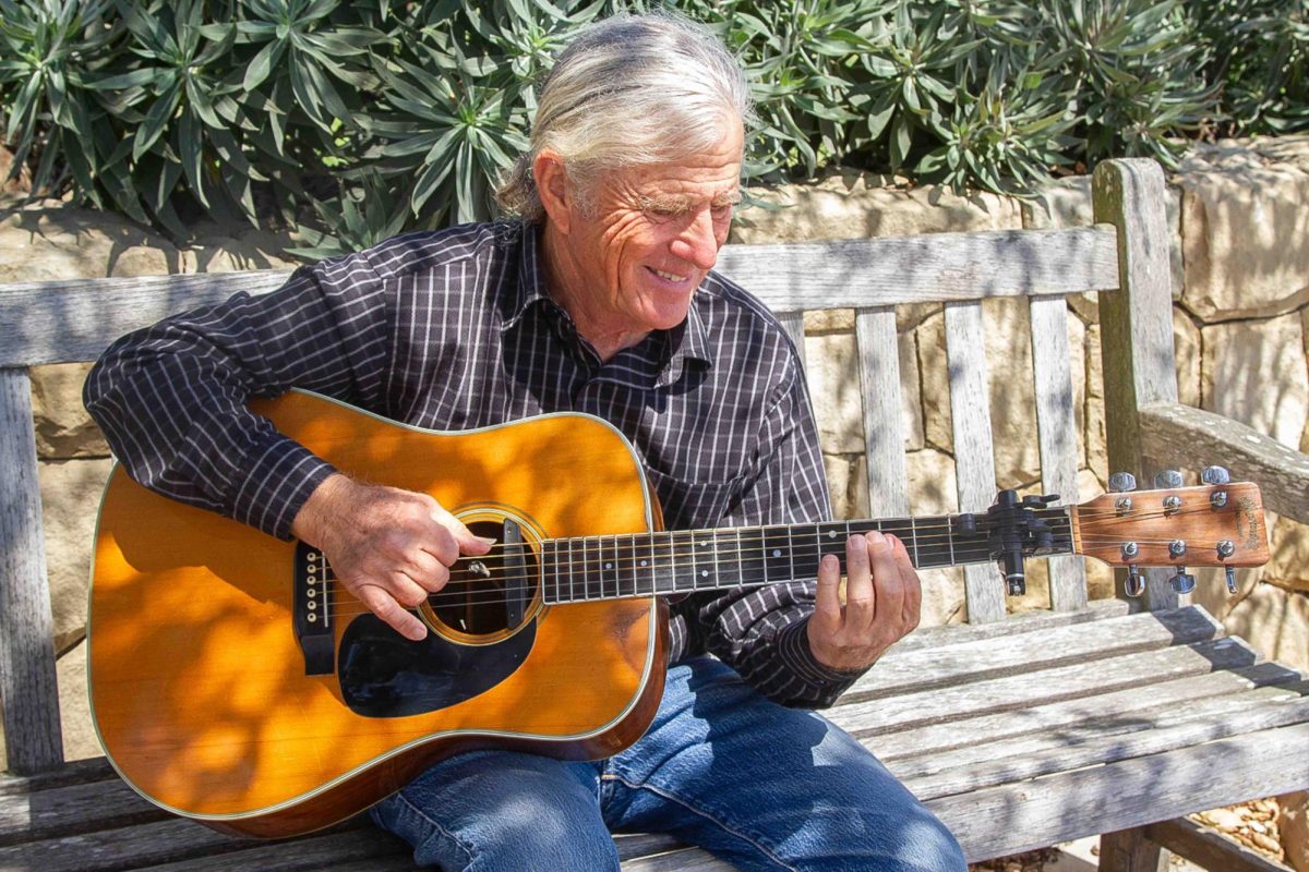 Benjamin Ryan strums his guitar on City College’s West Campus on Sept. 12 in Santa Barbara, Calif. Ryan utilizes his capo invention, Freestyle, to create higher pitches with unique notes. Since the age of 12, Ryan has had a passion for music and it shows through his playing. 