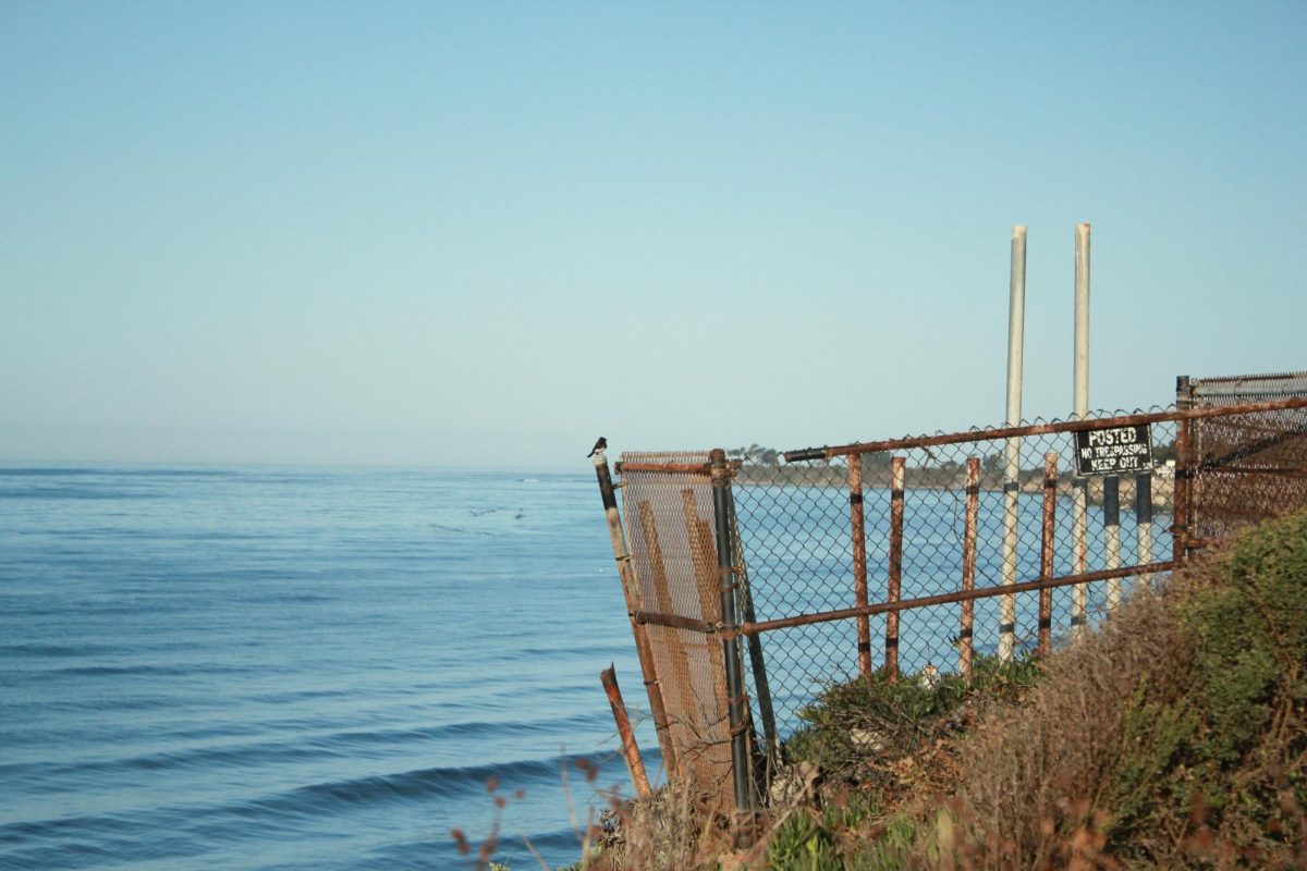 The corroded railings perch over the edge of the bluffs on Sept. 18 in Isla Vista, Calif. The bluffs on average lose approximately six inches per year.