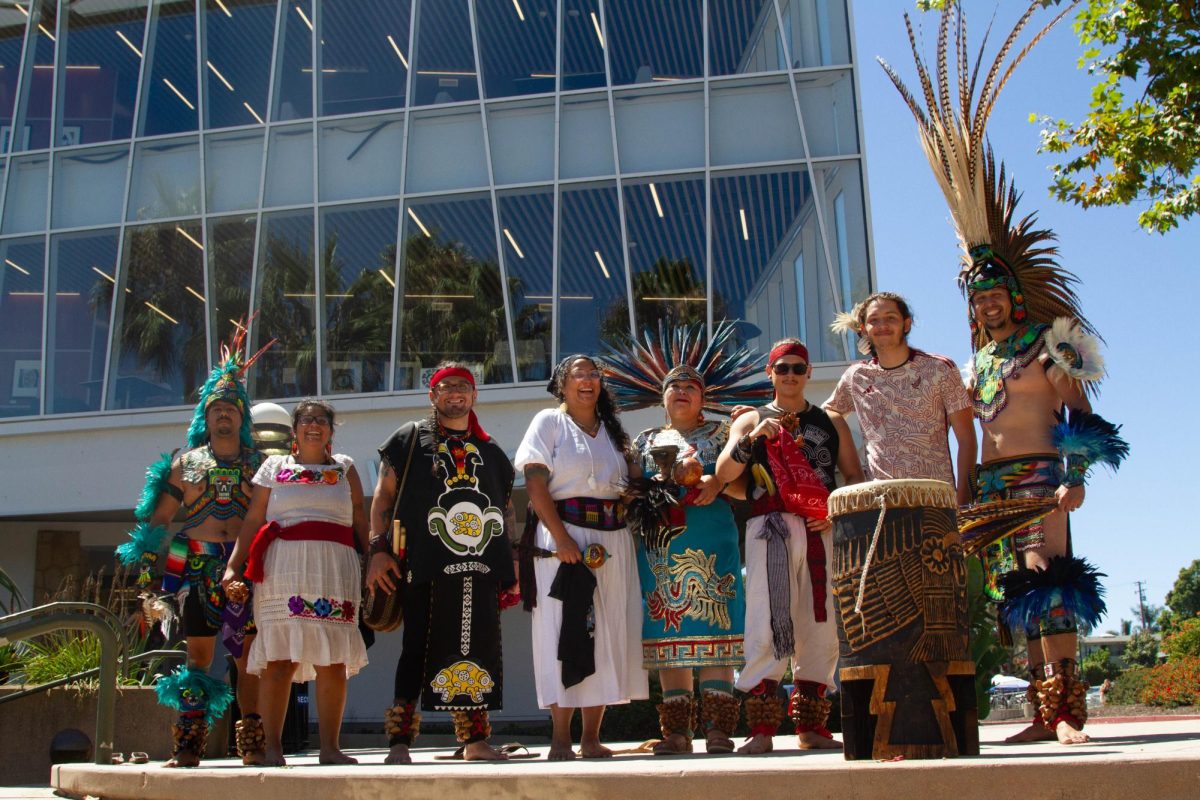 Presenters Resistencia Mexicayolt Chalchiutlicue stand in front of City College's campus center on Tuesday, Sept. 9 in Santa Barbara, Calif. The group hopes to represent the importance of Latine Heritage Month.