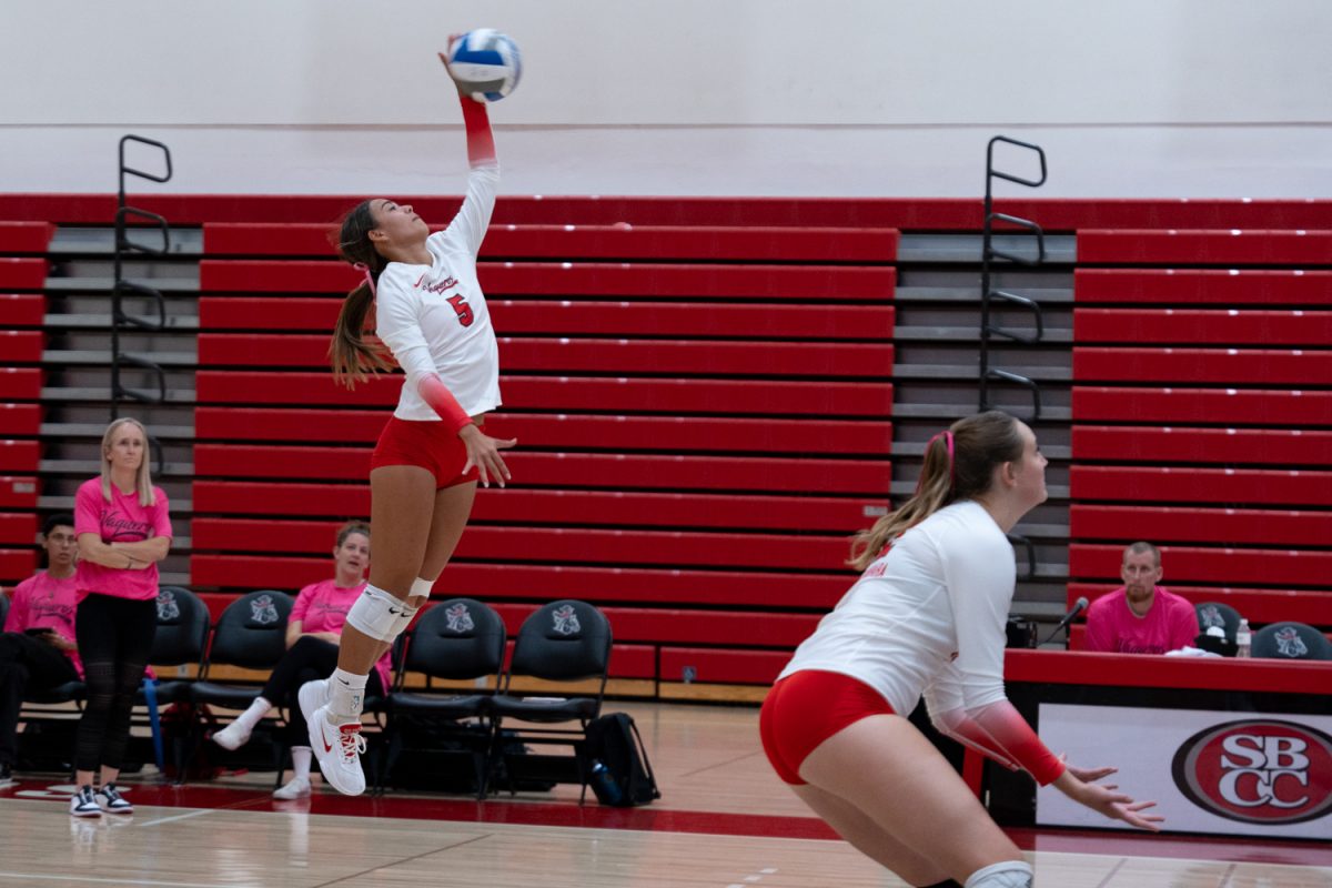 Lina Husek smashes the ball in the game against LA Pierce on Oct. 18, 2024 at the Sports Pavilion at City College in Santa Barbara, Calif. Husek is an opposite hitter/defensive specialist coming to Santa Barbara from Hawaii.