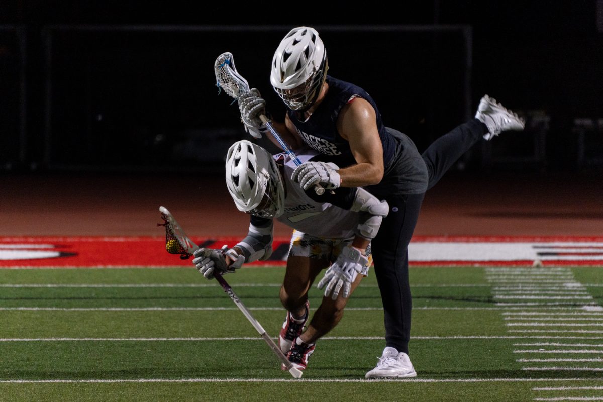 Carlo Rios maintains possession of the ball after a hit from Ryan Carricabaru on Oct. 16 at the La Playa Stadium at City College in Santa Barbara, Calif. The club’s advisor Eiko Kitao has been with the program since 2016.