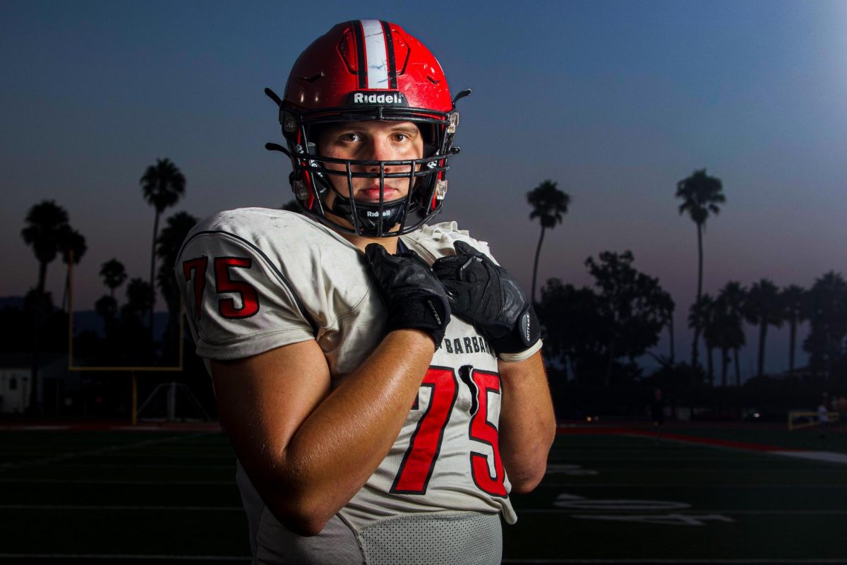 Maximilian Dollhopf from Dettenhauser, Germany clutches his jersey and gazes forward on Oct. 2, 2024 at La Playa Stadium at City College in Santa Barbara, Calif. "It's a beautiful place...the school is great... I love the coaches, love the team, so there wouldn't be any other players that I'd want to be with right now," Dollhopf said.