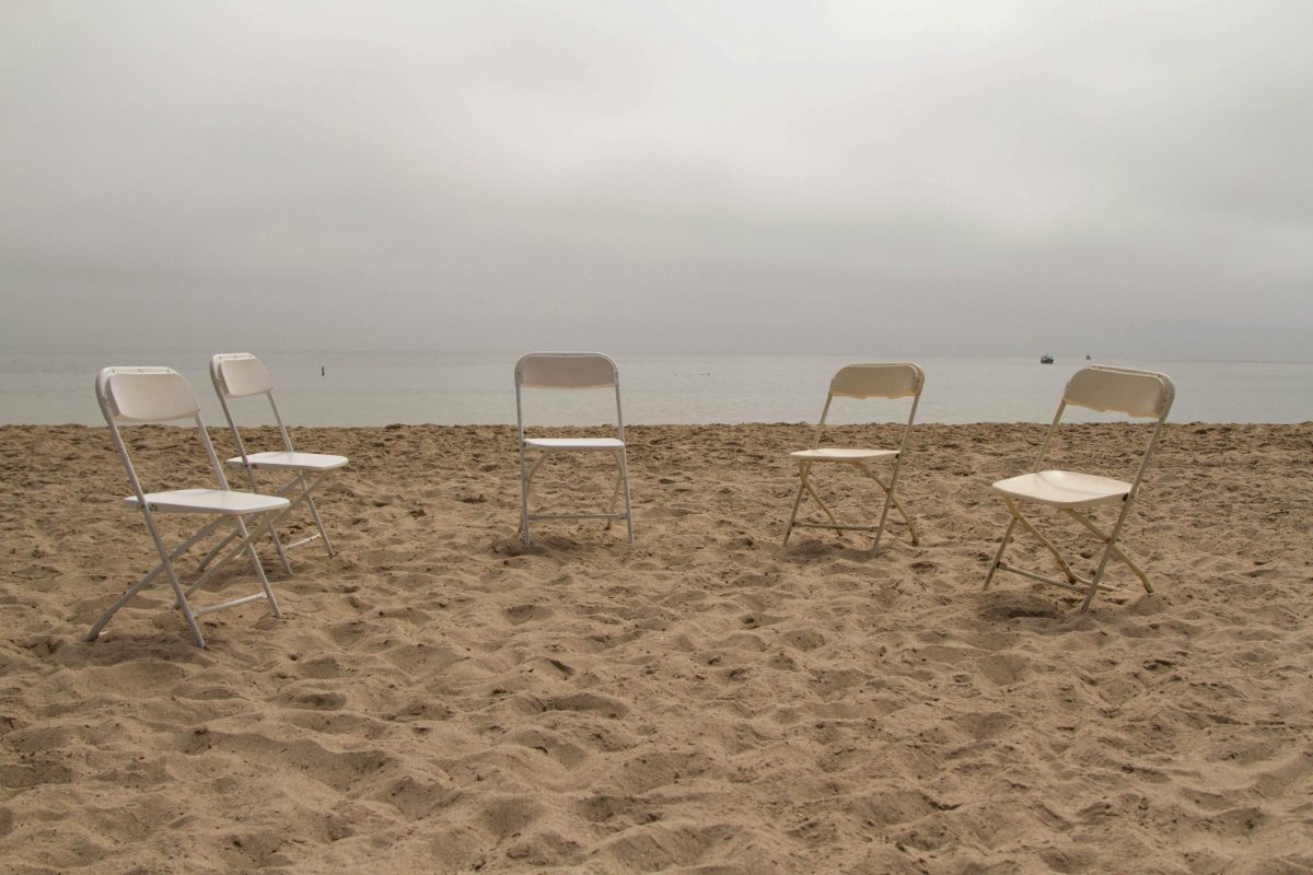 Photo illustration of five empty folding chairs on Sept. 24 at Leadbetter Beach in Santa Barbara, Calif. The Serenity Group meets weekly, guiding attendees through a 12 step process into recovery.