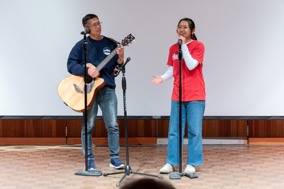 Jing Su and her uncle Youquan Su perform the song Just Like Your Tenderness at the talent show on Nov. 21 at the BC Forum at City College in Santa Barbara, Calif. The duo didn’t take part in the contest, but still performed as a non-competitive act.