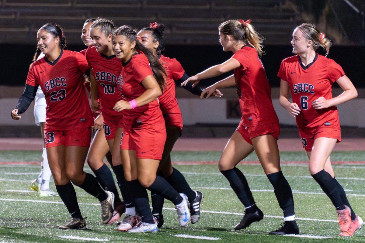 The Vaqueros celebrate after Cara Christopherso, No. 10, scored the only goal of the game against Allan Hancock on Oct. 1 at La Playa Stadium at City College in Santa Barbara, Calif. Christopherson has scored 10 goals this season.