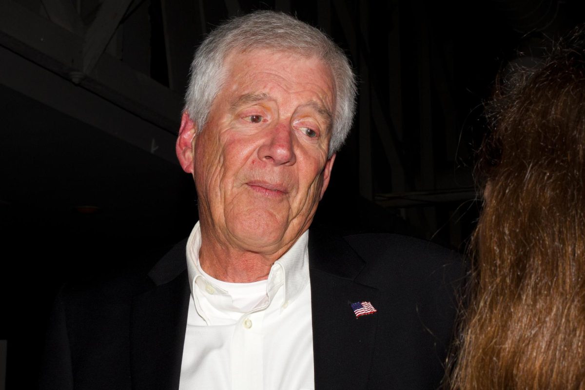 David Morris listens to a journalism 101 student on Nov. 5 at the Democratic party at SoHo in Santa Barbara, Calif. "When I started this I had no idea what I needed to do... I really appreciate the support I got, it was critical," Morris said.