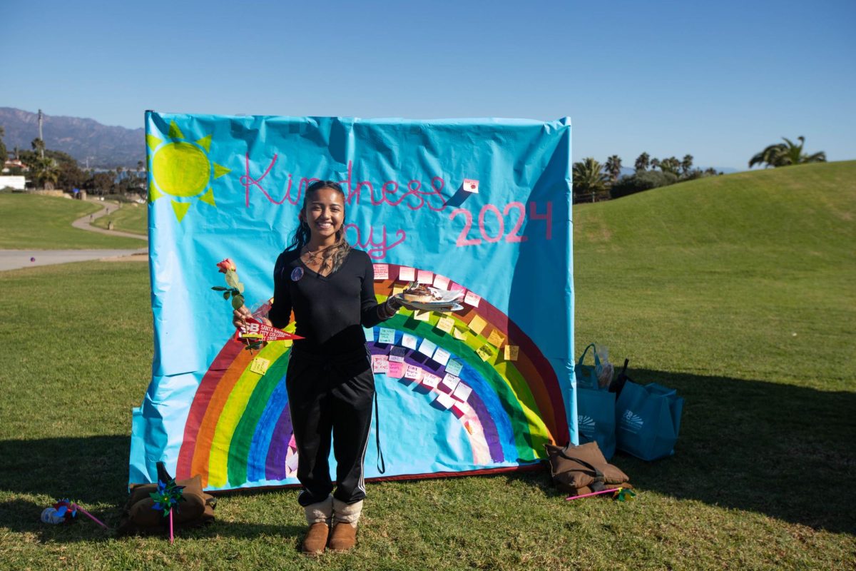 Track and Field runner Zet Contreras participates in Kindness Day on Nov. 13 in Santa Barbara, Calif. Contreras visited each booth and received tokens from each as well as pizza and a cupcake.