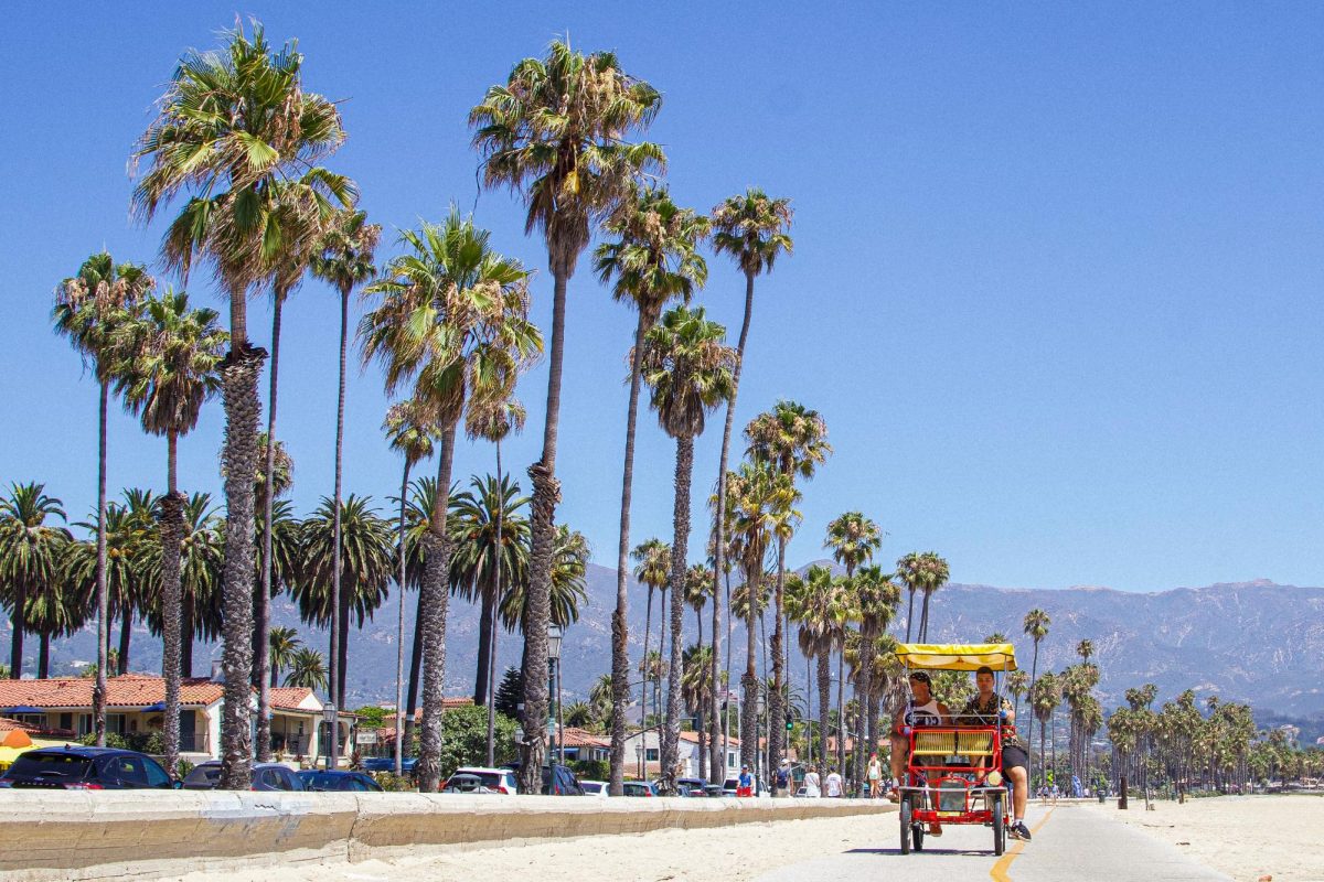 A Santa Barbara tour bike rolls through the bike path at West Beach on Aug. 15 in Santa Barbara, Calif. City College is the thread that weaves people together from all over the world.