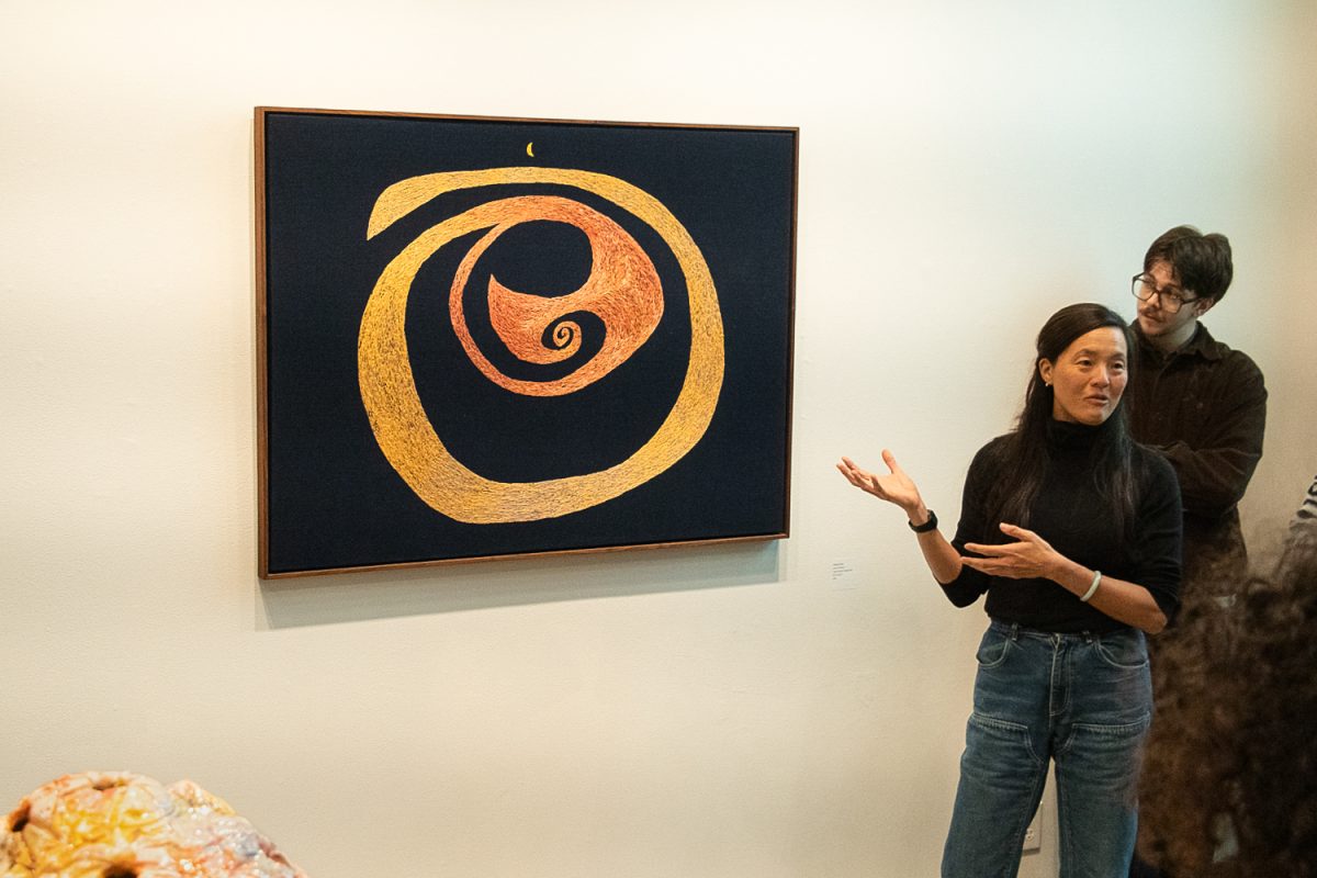 Artist Vanessa Chow's presents "Cosmic Whirlpool" consisting of cotton thread on indigo fabric Feb 12, 2025 at the Atkinson Art Gallery in Santa Barbara Calif. Chow planted cotton plants in her garden to produce the thread that would be used to sew the image