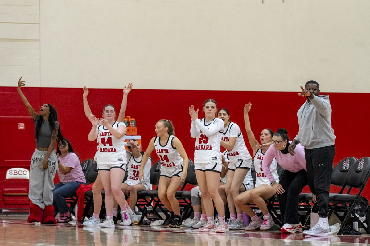 On Feb. 15, the women's basketball team cheers at the City College Sports Pavilion in Santa Barbara, Calif. Known as the loudest bench in the league, the Vaqueros bring energy and support to their teammates. 