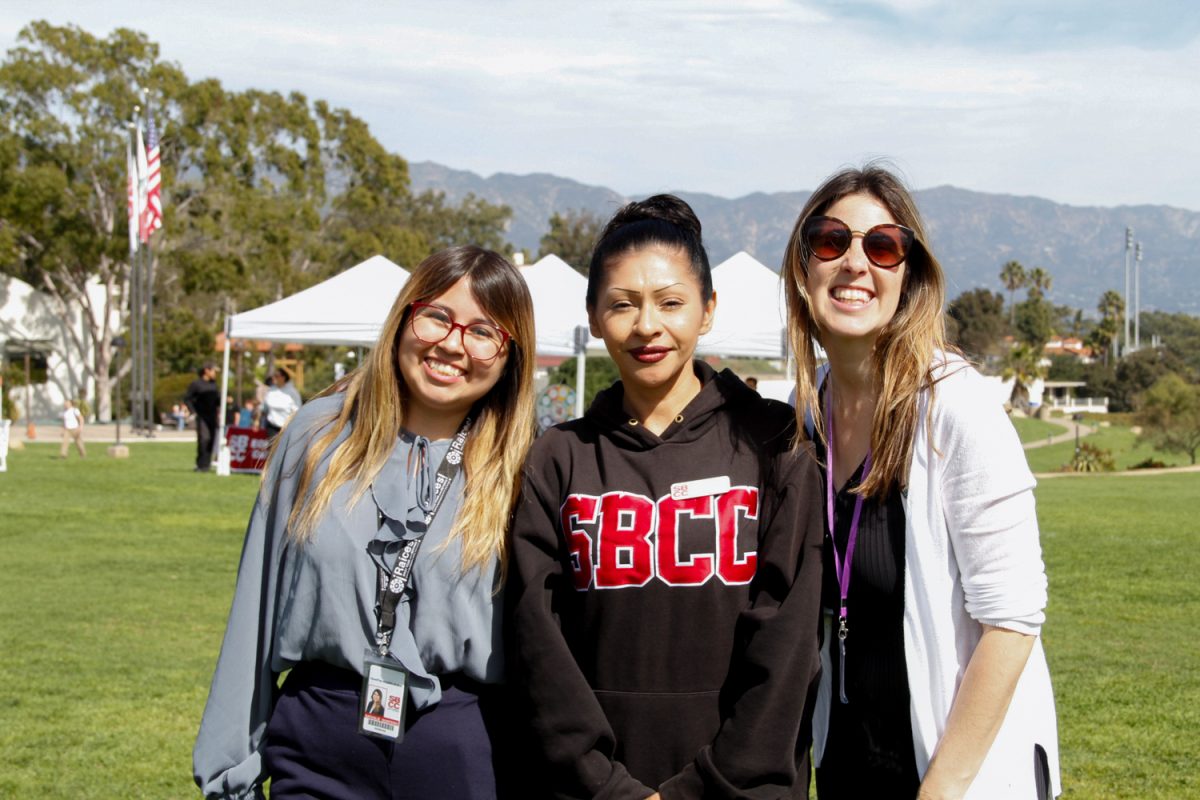 From left, Raíces student program advisor Nathalie Quintero, Basic needs program advisor Alondra Gonzales, and Health and wellness program advisor Rebecca Bean Feb. 27 at City College's Great Meadow in Santa Barbara, Calif. The Spring Wellness Bienvenida was a collaboration between Raices, The Well, and the Basic Needs Center.